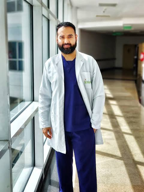 Dr Anuj Taneja